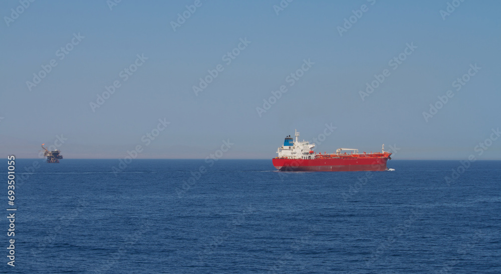 A merchant ship underway at sea in calm weather