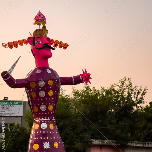 Ravnans being ignited during Dussera festival at ramleela ground in Delhi, India, Big statue of Ravana to get fire during the Fair of Dussera to celebrate the victory of truth by Lord Rama photo