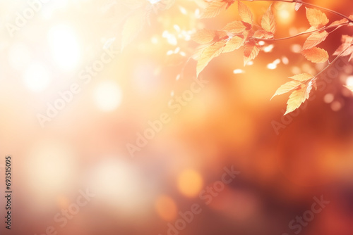 autumn background blurred with red-gold leaves rays of sunlight