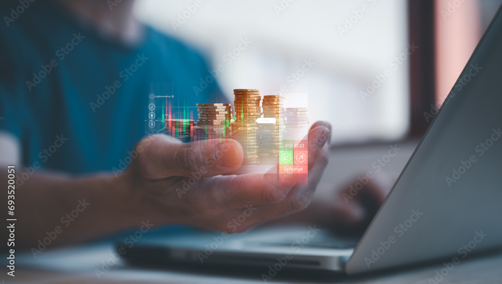 investment and finance concept, businessman holding virtual trading graph and blurred coins on hand, stock market, profits and business growth. - obrazy, fototapety, plakaty 