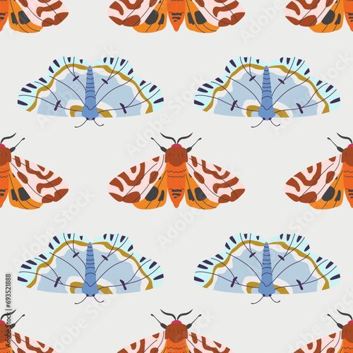 Seamless pattern with butterflies and moths. Wallpaper with decorative insects with colorful wings. Endless flat vector illustration photo
