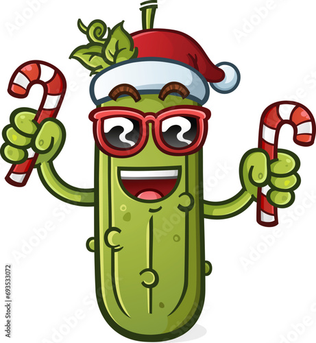 Cool christmas pickle cartoon with attitude and sunglasses holding a a couple festive candy canes for all the good girls and boys on christmas morning