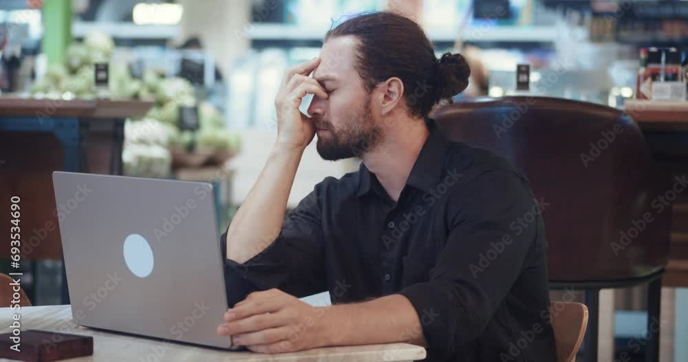 Job burnout male freelancer feels long-term debilitating stress, which can arise from work at laptop overload and fatigue. Concentrated man is frustrated by unsolved problems Job burnout concept Job burnout male freelancer feels long-term debilitating stress, which can arise from work at laptop overload and fatigue. Concentrated man is frustrated by unsolved problems Job burnout concept