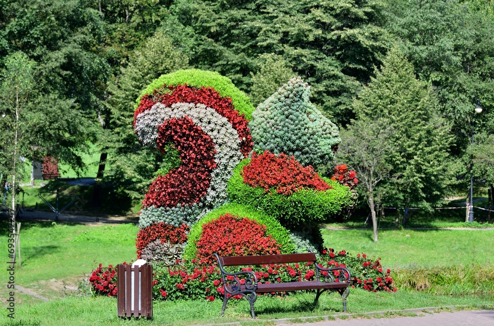 Ornamental decoration and tourist attraction squirrel made of ornamental flowers