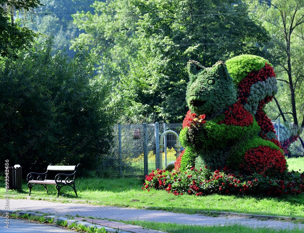 Ornamental decoration and tourist attraction squirrel made of ornamental flowers
