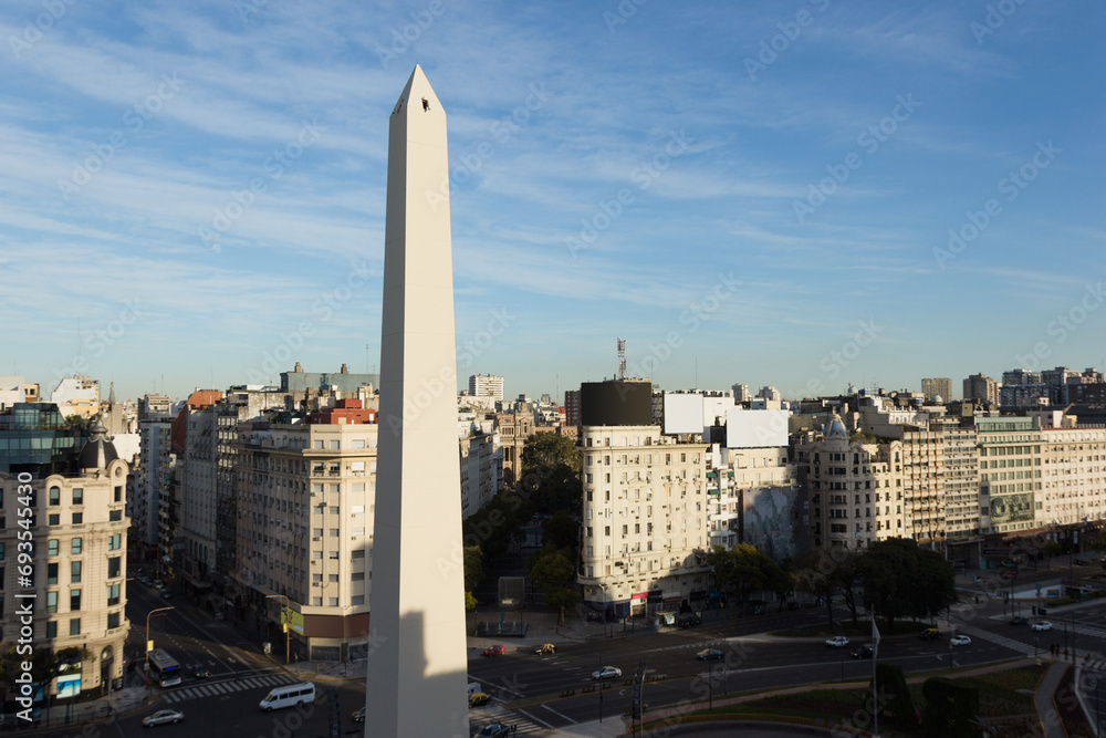 Aerial view of downtown Buenos Aires, Argentina. The iconic Obelisk is illuminated by the sunrise