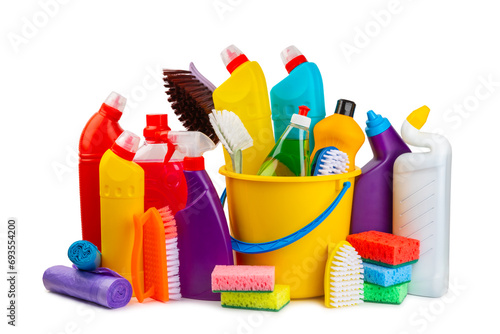Cleaning items in a bucket isolated on a white background. Cleaning products for home cleaning isolated.Cleaning concept.Close-up. Household chemicals.detergents in plastic bottles, sponges and gloves