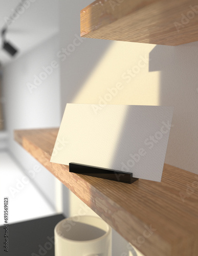 Featuring a simple and harmonious background, this premium business card mock-up file is perfect for showcasing your branding and logo.