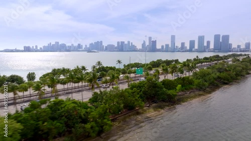 Tree landscape on the Julia Tuttle Causeway Miami Beach with view of downtown in background photo
