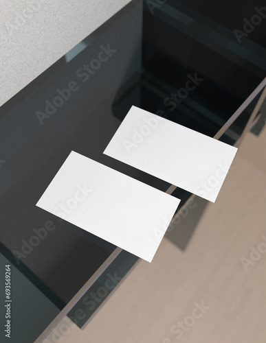 Featuring a simple and harmonious background, this premium business card mock-up file is perfect for showcasing your branding and logo.