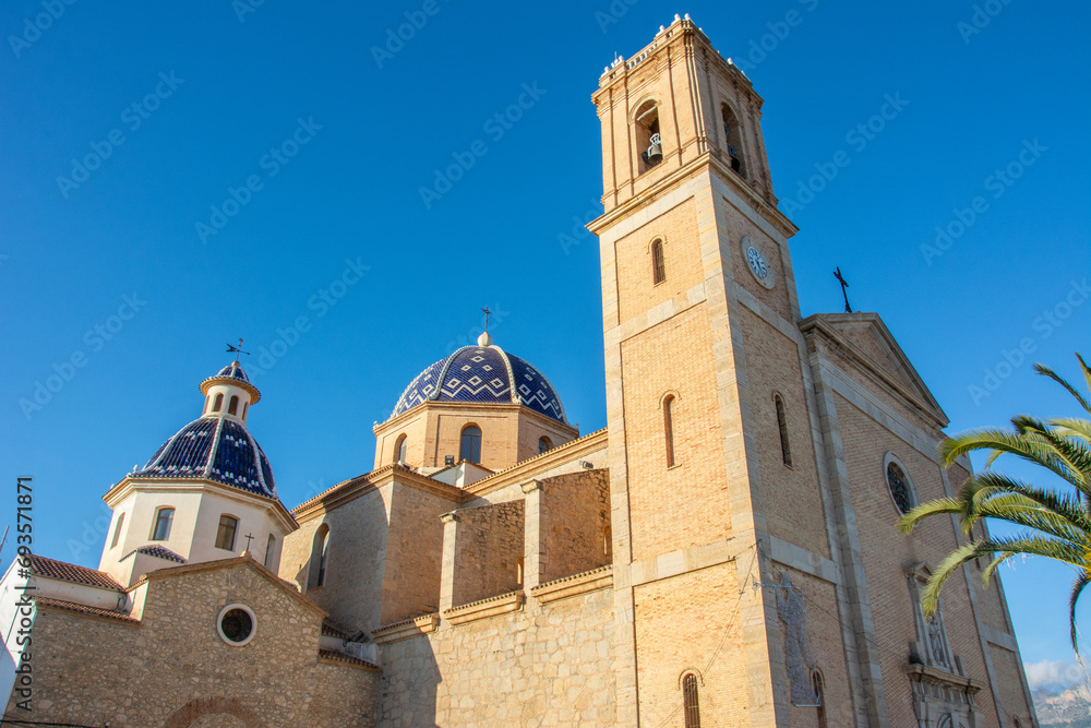 Picturesque blue and white domes, tiled with glazed ceramics of the church of La Mare de Deu del Consol (