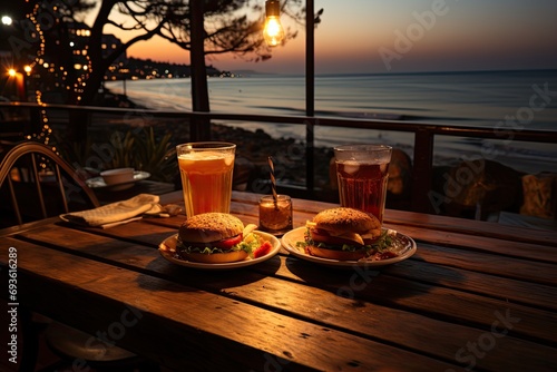 A hamburger with chips in a seaside coffee overlooking the ocean., generative IA