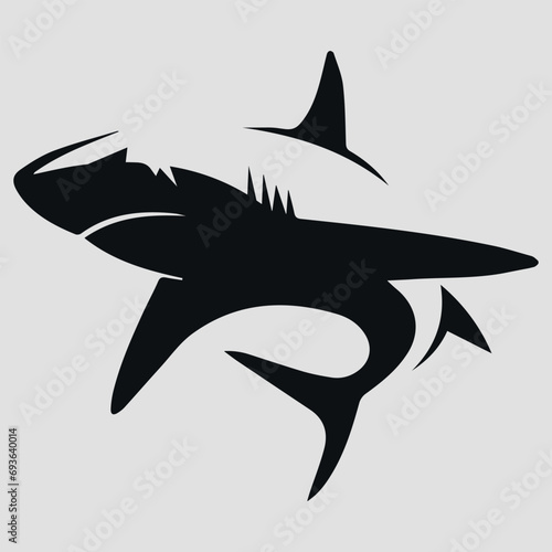The black silhouette of a shark. Vector icon on a gray background	