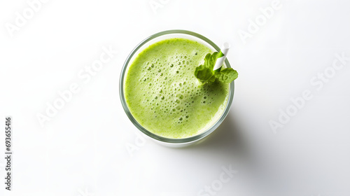 Green Smoothie Topped with Fresh Mint Leaf in a Glass