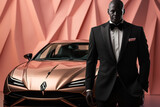 African American brutal man in a suit and a car on a pink abstract background