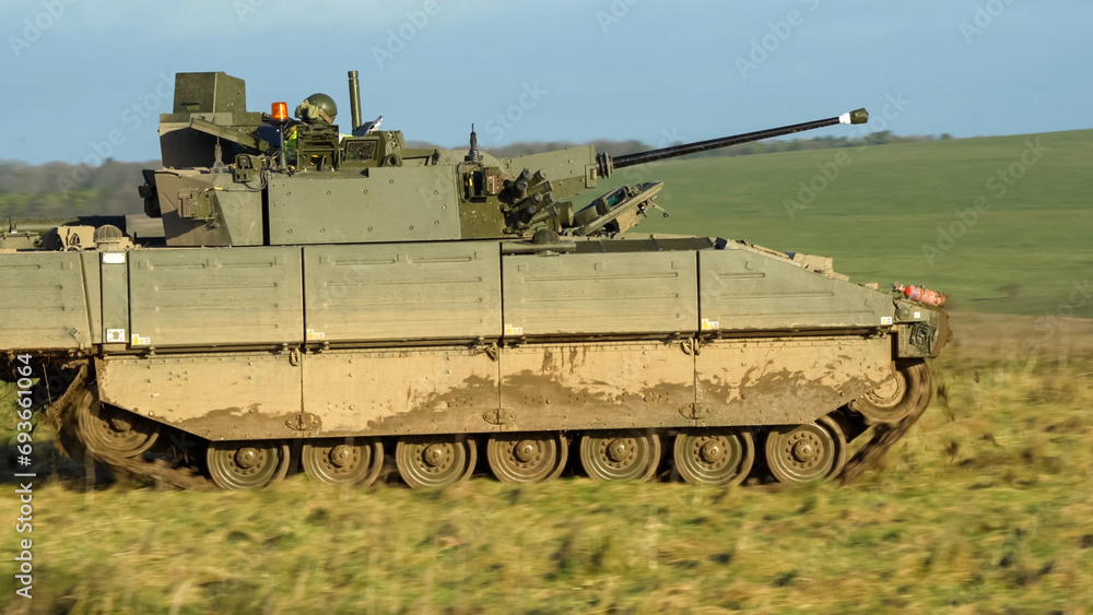 British army General Dynamics Ajax Reconnaissance and Strike armoured fighting vehicle (AFV), tank in action. Wilts UK British army General Dynamics Ajax Reconnaissance and Strike armoured fighting vehicle (AFV), tank in action. Wilts UK