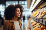 Portrait of a smiling young woman shopping in supermarket