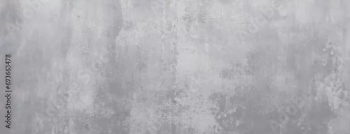 Obraz  z motywem Abstract Concrete Wall with Textured Finish. A wide, high-resolution image of a concrete wall featuring a blend of textures and shades of gray