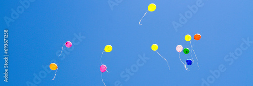 Colorful baloons in the blue sky