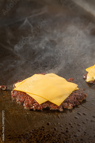 smash burger cheese cooking photo