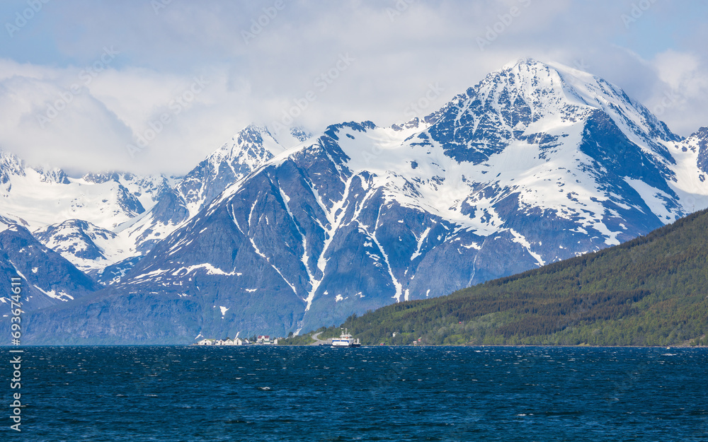 Lyngenfjord in Troms eg Finnmark in Norway with massice mountains with ice and snow Lyngenfjord in Troms eg Finnmark in Norway with massice mountains with ice and snow