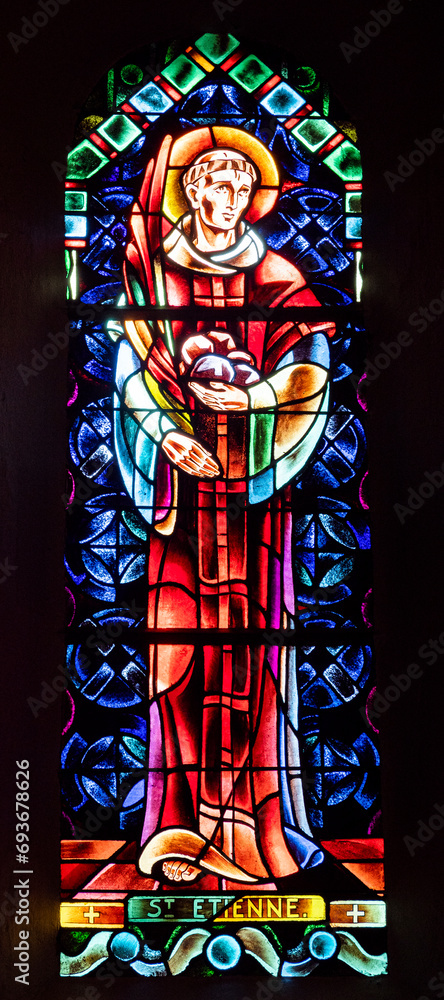 Stained glass window of church, Saint Étienne de Baigorry, Basque Country, New Aquitaine, France.