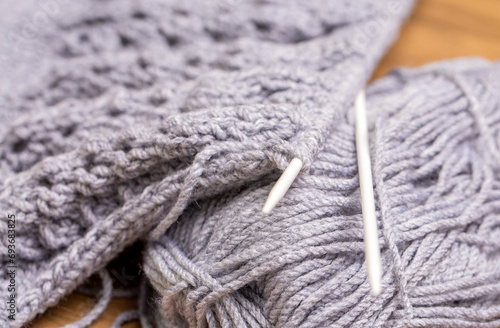 Old woman's hands are knitting