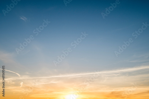 sun in the center of an evening sky