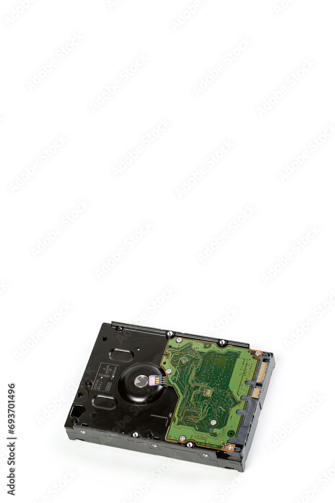 Disassembled hard drive on a white background, hard drive repair Disassembled hard drive on a white background, hard drive repair
