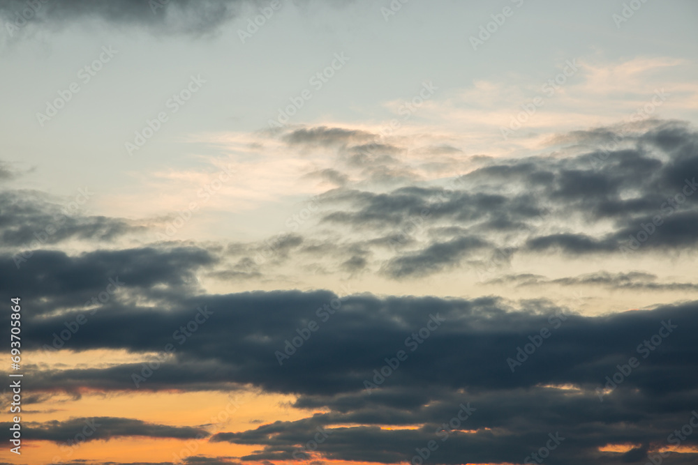 Beautiful orange sunset with big rain clouds Beautiful orange sunset with big rain clouds