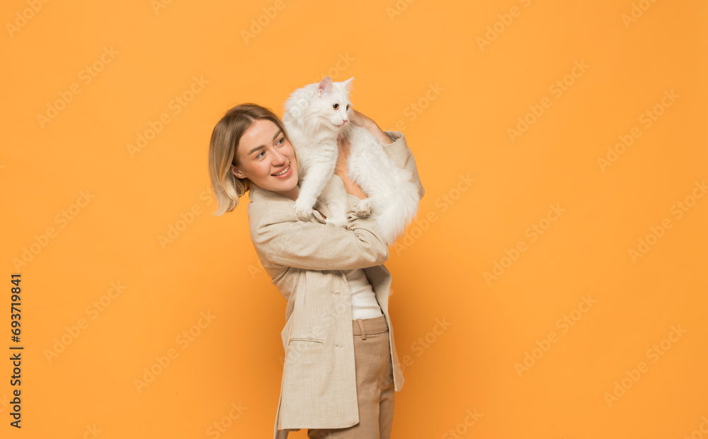 portrait of a white cat with a girl on a yellow background portrait of a white cat with a girl on a yellow background