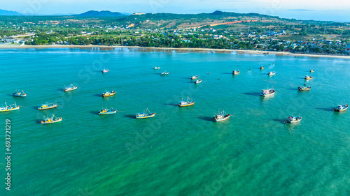 Aerial view of sea Mui Ne, Vietnam see the whole bay of Ke Ga from north to south shore very large with sea waves, ships, reefs is tourism potential Status of Vietnam. photo
