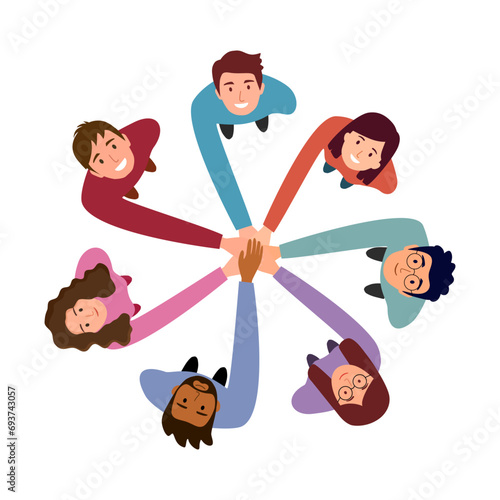 People in a circle with hands on top of each other top view. Teamwork. Team together.