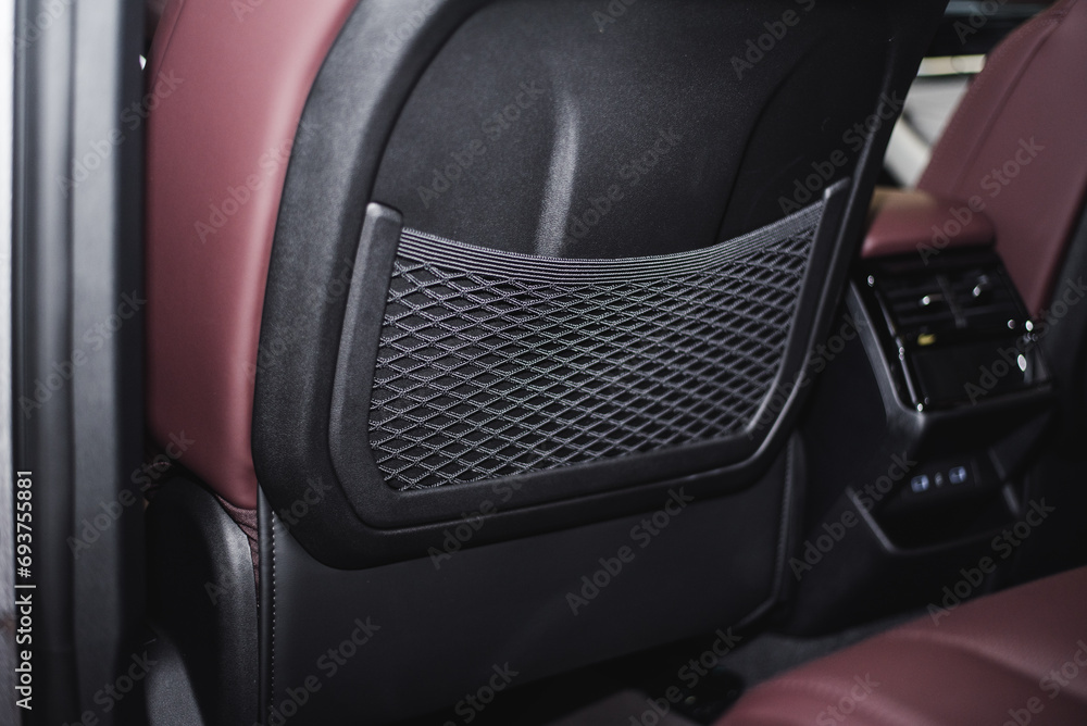 mesh behind driver's seat for storage