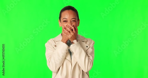 Green screen, laugh and hands on face of woman in studio shocked by gossip, rumor or joke on mockup background. Happy, joke and portrait of lady person with emoji reaction to comedy, secret or drama photo