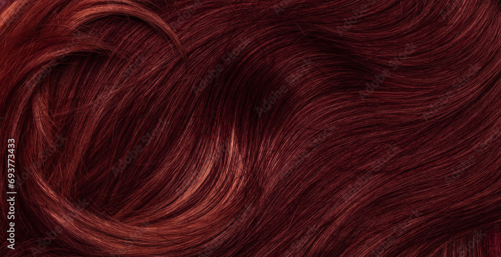 Naklejka premium Dark red hair close-up as a background. Women's long brown hair. Beautifully styled wavy shiny curls. Coloring hair with bright shades. Hairdressing procedures, extension.