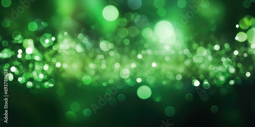 Blurred view of festive lights on green background. Bokeh effect