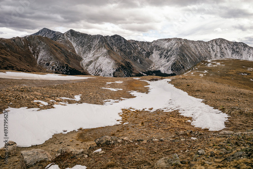 Snowy plateau with Grays and Torreys Peak in the background, Colorado photo