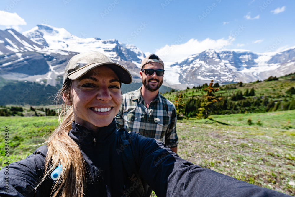 Hiking Couple Taking Selfie In Jasper