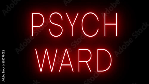 Flickering red retro style neon sign glowing against a black background for PSYCH WARD photo