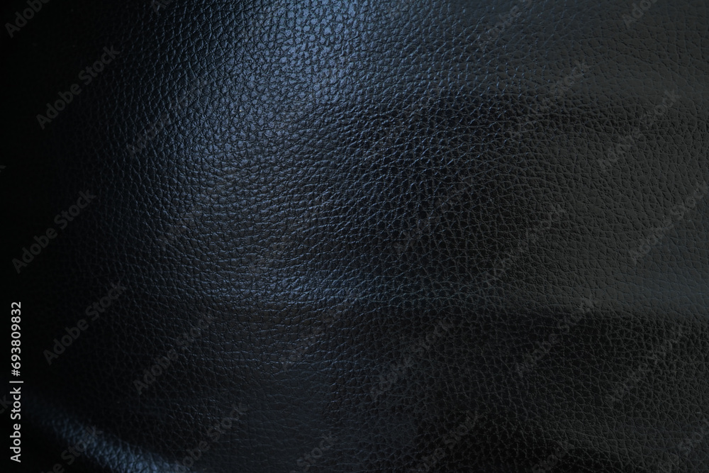 Black background. Leather car seat covers and sofas. Black background. Leather car seat covers and sofas.