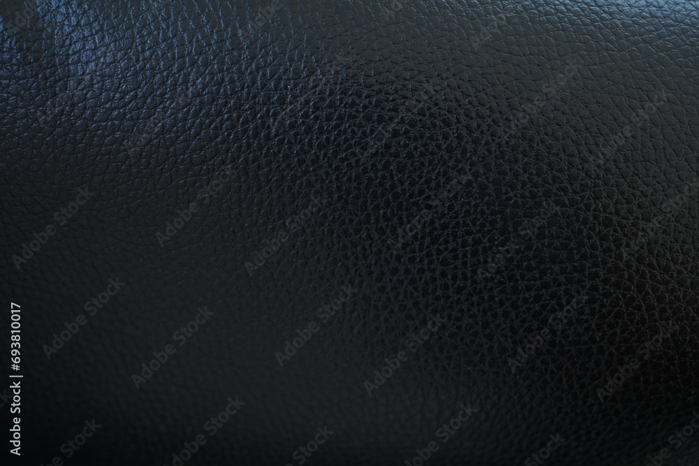 Black background. Leather car seat covers and sofas. Black background. Leather car seat covers and sofas.