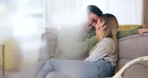 Man, woman and love, couple on sofa with trust, intimacy and affection at home with bonding and care. Happy relationship, people relax in living room and forehead touch with commitment and romance