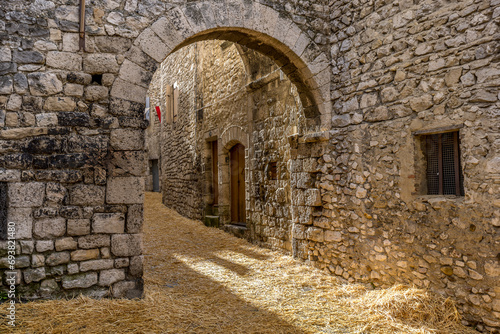 Arched passageway in an alleyway of a small medieval village in Provence  France