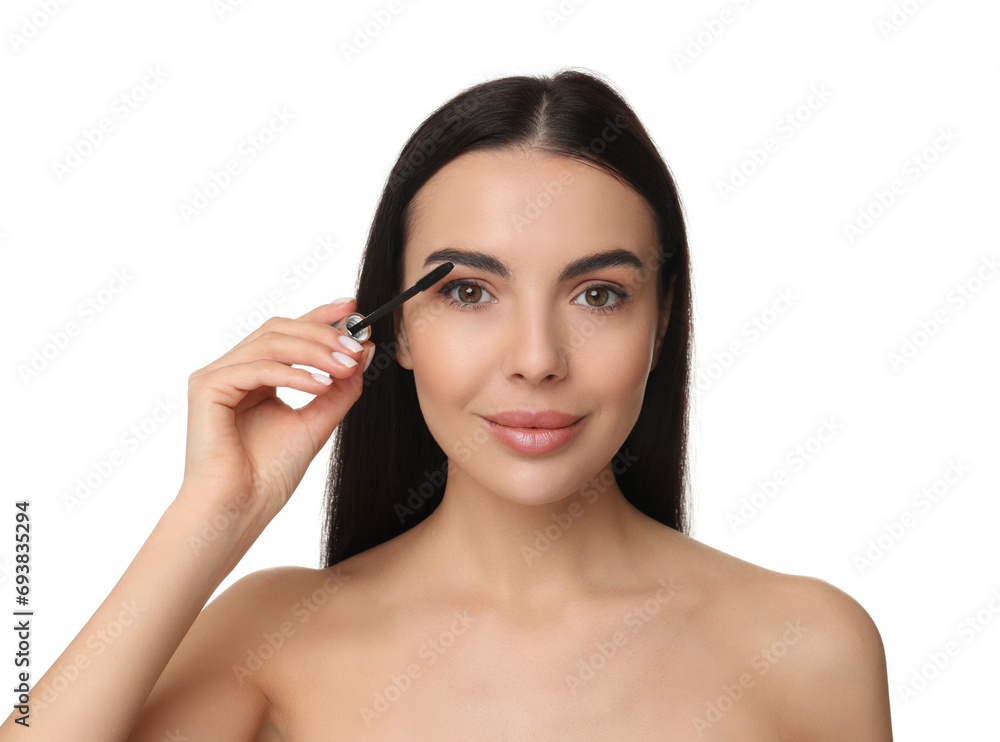 Beautiful young woman applying mascara on white background Beautiful young woman applying mascara on white background