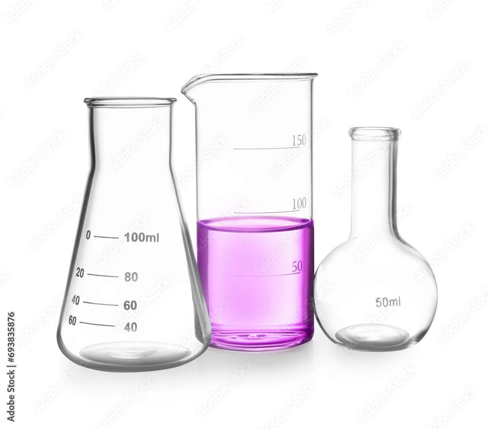 Glass flasks and beaker with color liquid isolated on white Glass flasks and beaker with color liquid isolated on white