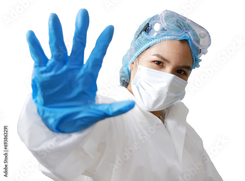 Powerful of doctor Asian woman in Personal Protective Equipment or PPE clothing and Healing for patient and showing stop hand sign for virus on transparent