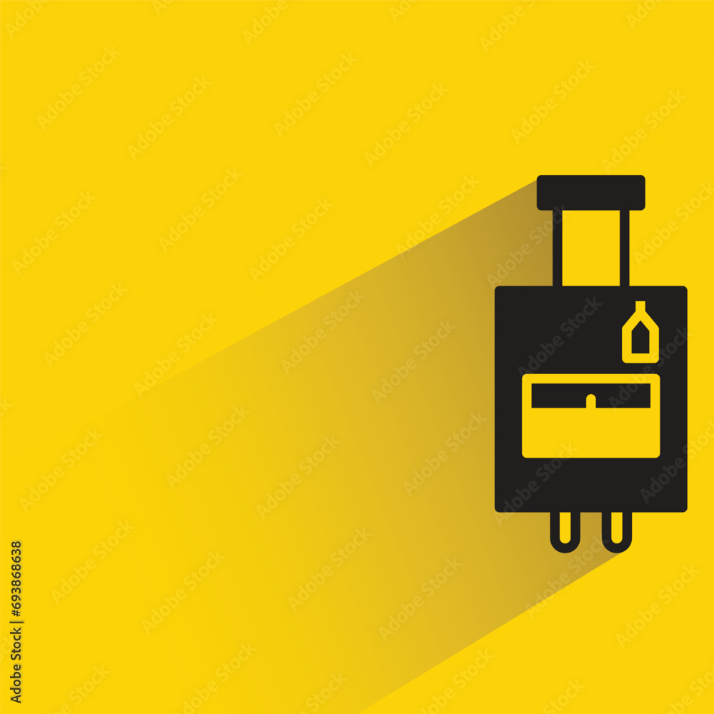 travel bag with shadow on yellow background travel bag with shadow on yellow background