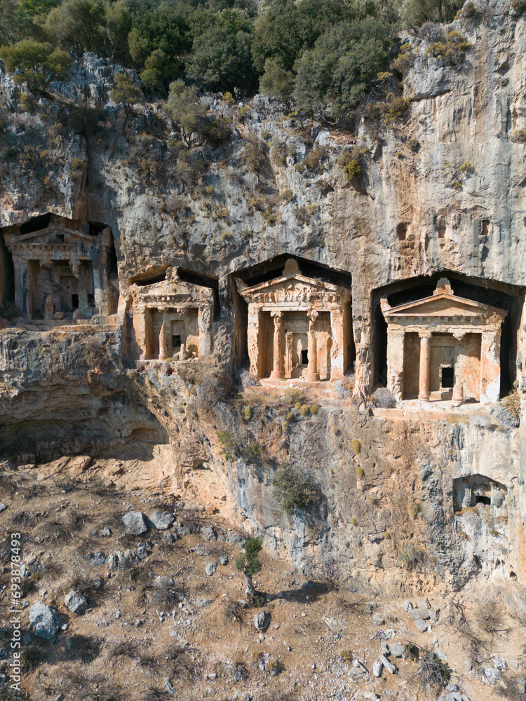 Dalyan, Mugla. Turkey Kings tombs in the cliff face Kaunos Dalyan, Turkey. Aerial view . High quality photo