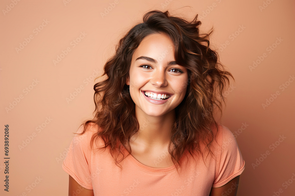 Studio portrait of a beautiful young woman with an attractive smile. Studio portrait of a beautiful young woman with an attractive smile.